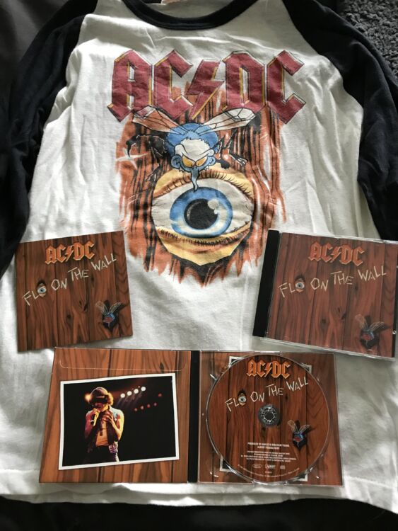 ACDCFlyOnTheWallII-563x750.jpg