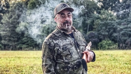 aaronlewisjune2022gun_420x237.jpg