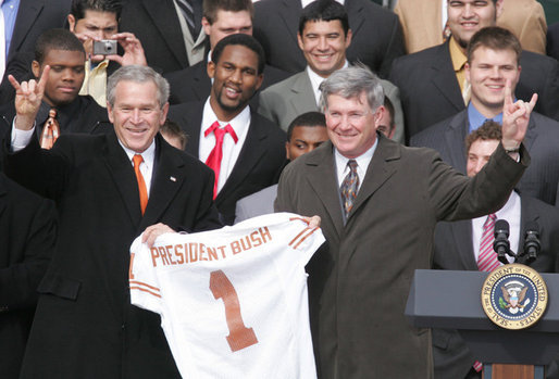 George_W._Bush_and_Mack_Brown_with_the_2005_Texas_Longhorn_football_team.jpg